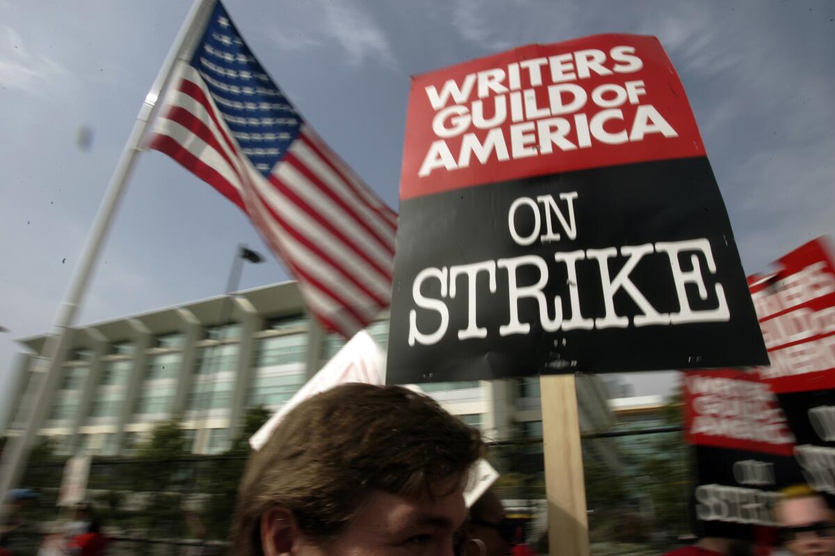 Writers Guild of America and Hollywood studios reach agreement to end strike